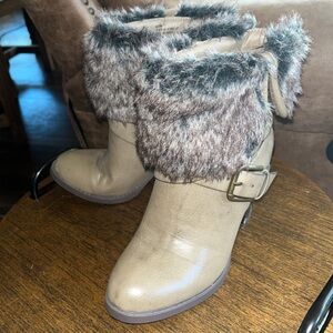 Tan with faux fur heeled boots. Size 6.5 from JustFab.